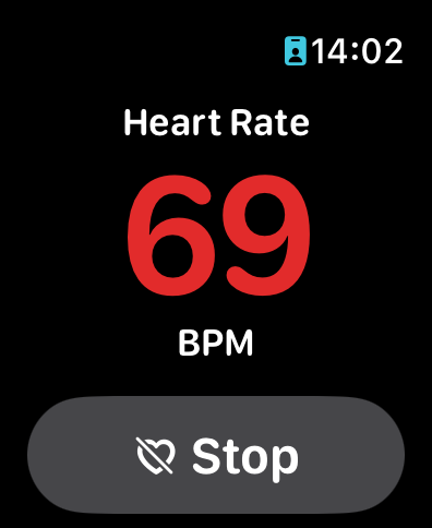 Apple Watch showing HRM app with Stop button — app is running